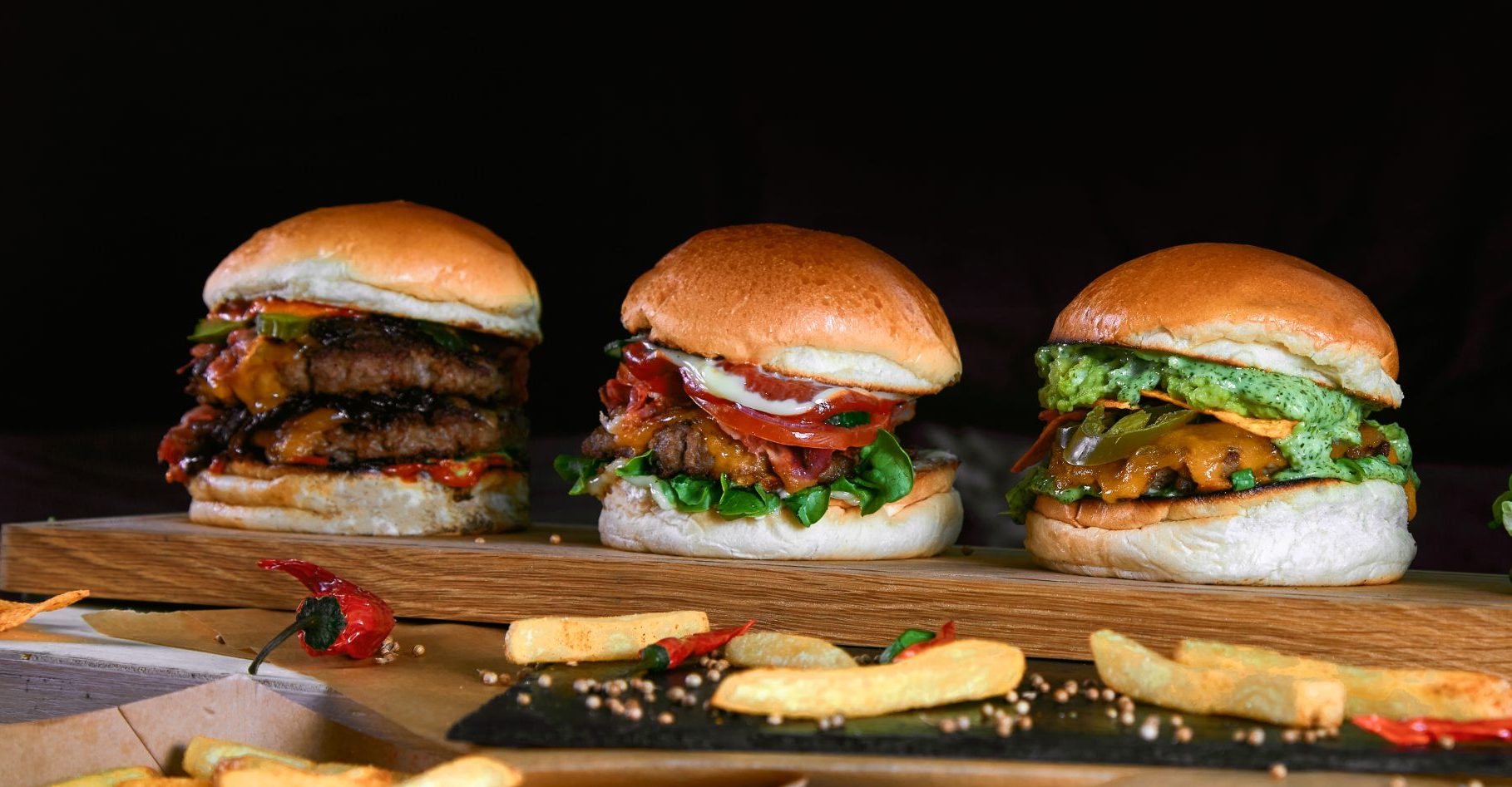 group-photo-of-different-kinds-of-burgers-on-a-woo-2024-11-26-14-58-57-utc